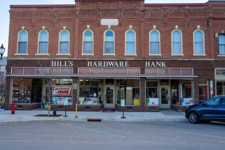A small independent hardware storefront on a historic main street